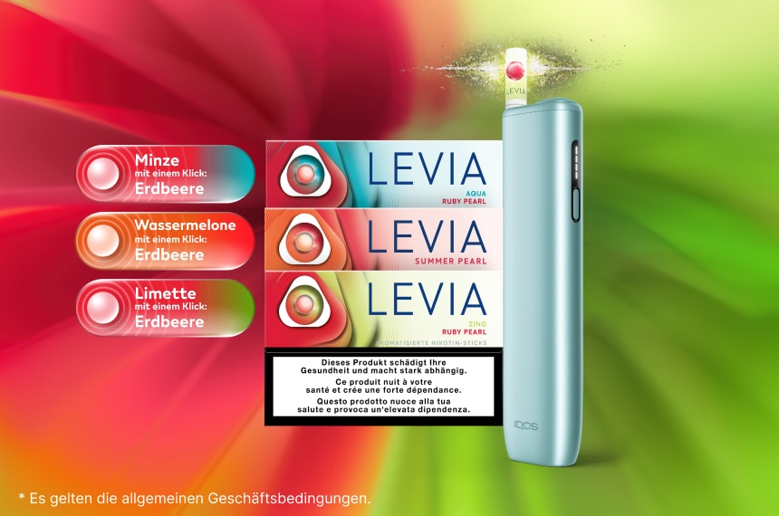 3 P&auml;ckli Terea &ndash; Sienna, Turquoise und Mauve Wave auf einem Felsen mit einem IQOS ILUMA i Ger&auml;t in Breeze Blue&nbsp;&ndash; umrahmt vom IQOS Key Visual im Tabakton.