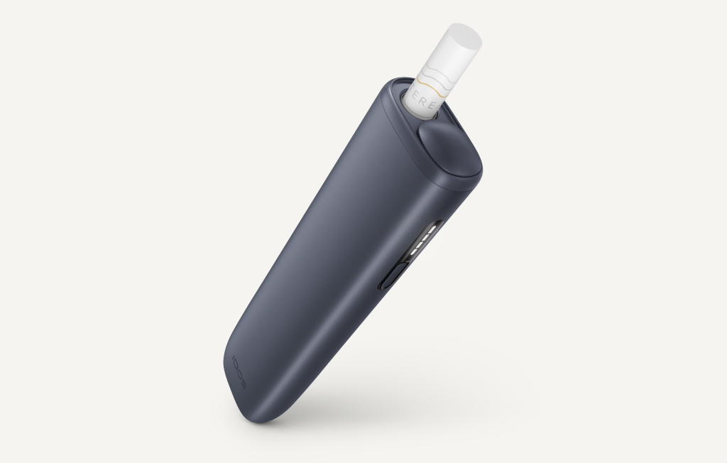 Midnight Black IQOS ILUMA i ONE device, right reclining position