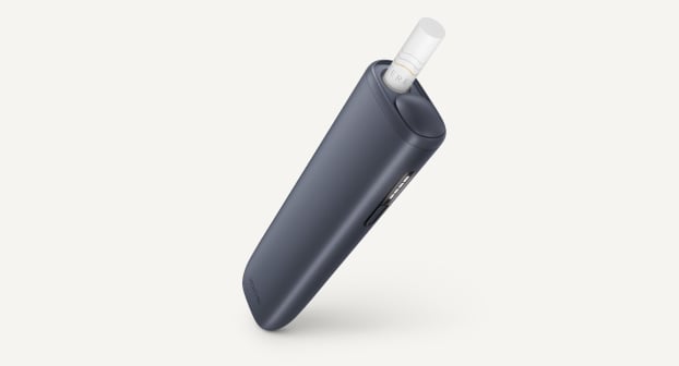 Midnight Black IQOS ILUMA i ONE device, right reclining position