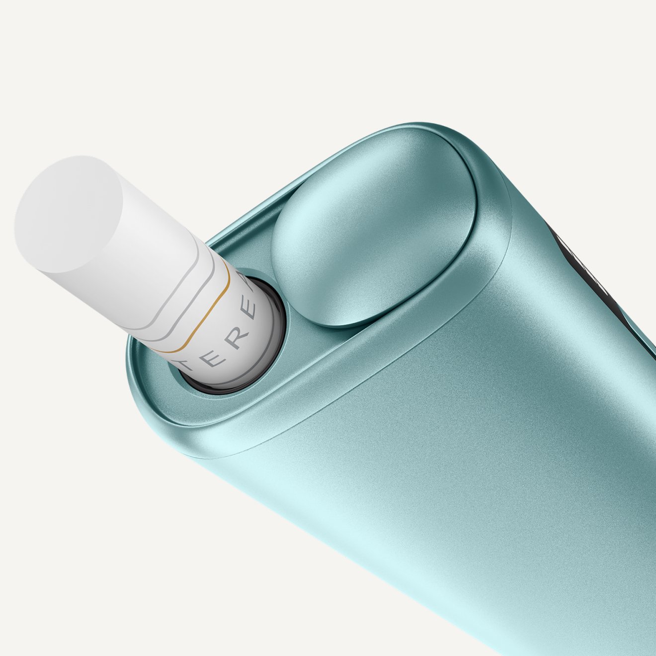 Detail of IQOS ILUMA i ONE device, with tobacco stick